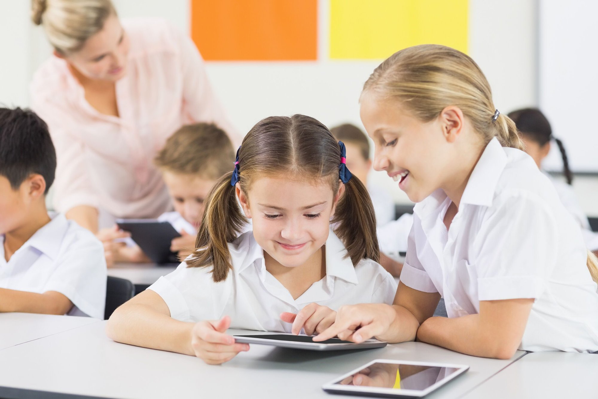 clearasound.com.auwp-contentuploads202208bigstock-School-kids-using-digital-tabl-140345558-scaled